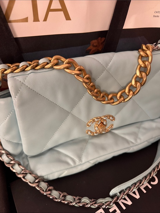 CHANEL Handbags - CHANEL Quilted Shoulder Bag in Pale Blue with Gold Chain